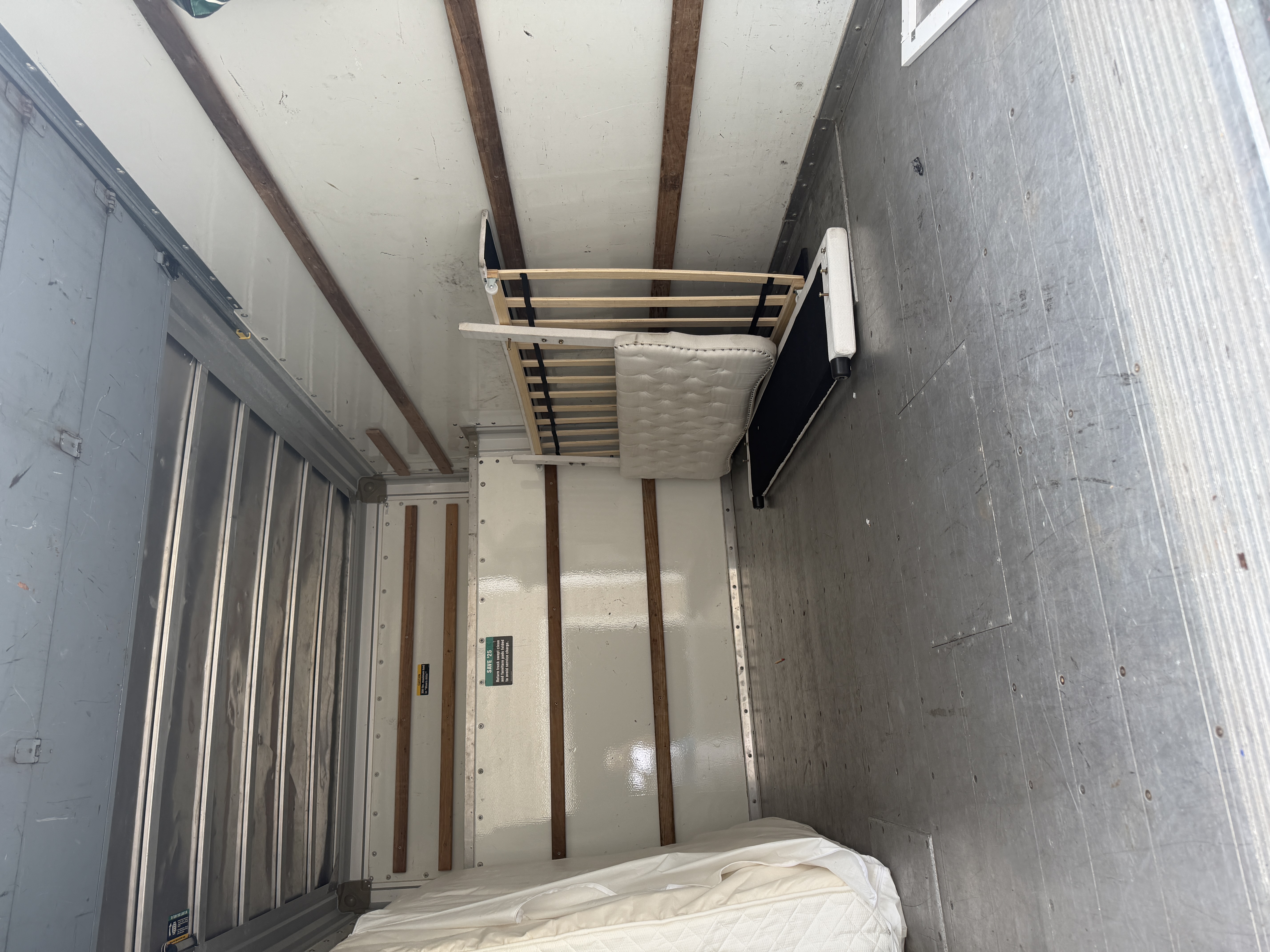 Inside a Clear Path Movers truck, loaded securely with furniture